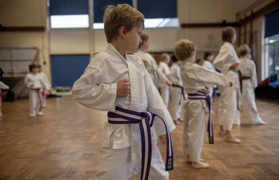 Children in a karate lesson